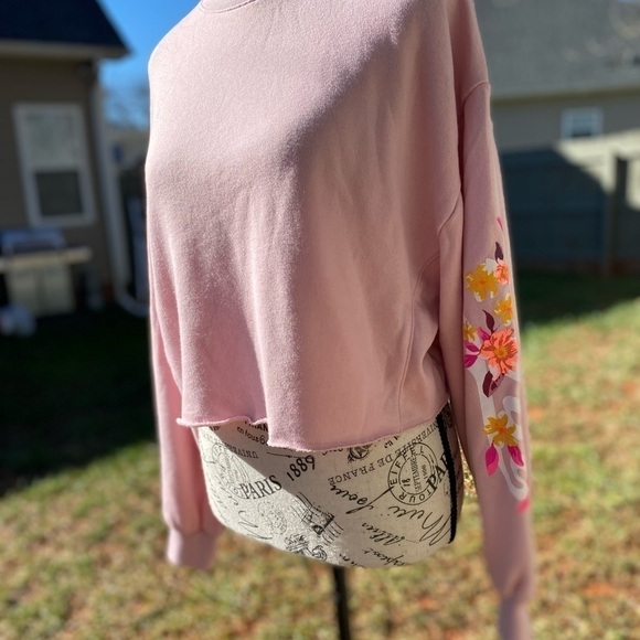 Pink Crop Sweatshirt In Pink With Flowers On The Sleeve - Picture 2 of 7